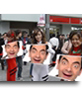 Photomontage in which three asian girls holding signs with your picture, in the