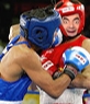 Photo montage in which you put a face on the body of a boxer in red shield, in battle
