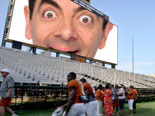 In this photomontage, your photo will appear on the big screen in a football