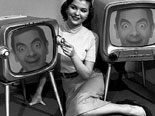 Photomontage in which you will leave in two old TV with a young woman lying between