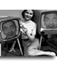Photomontage in which you will leave in two old TV with a young woman lying between