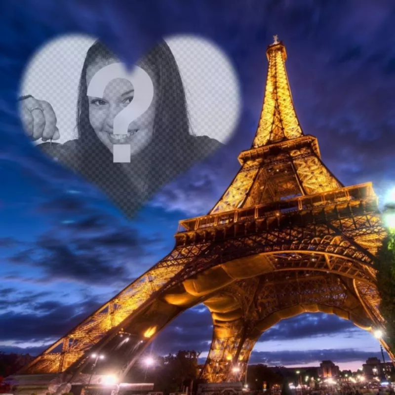Photomontage in Paris with the illuminated Eiffel Tower and a semitransparent heart shaped photoframe in the sky to place your..