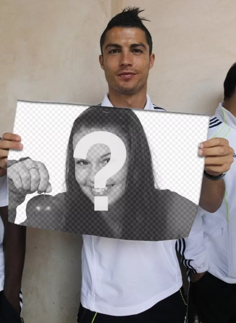 Photomontage with Cristiano Ronaldo, from the Real Madrid football team, holding a poster with the photo you upload online to..