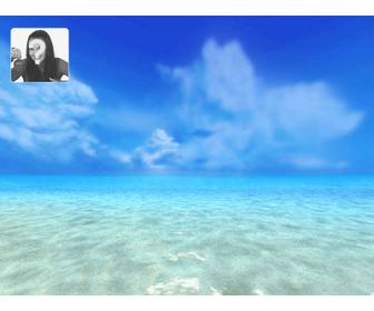 Screen background in which your photo appears with a background of blue sky and sea.