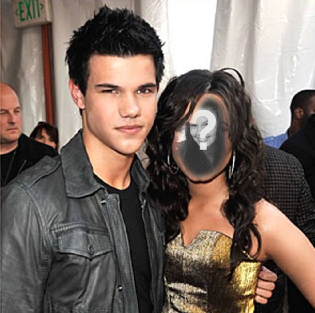 Have a photo as a woman next to Taylor Lautner, actor martial artist known for the Twilight saga. Up one side and save or send email..