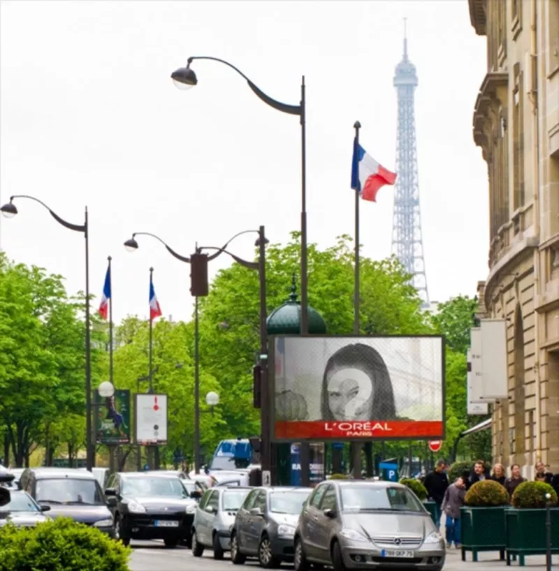 Photomontage of a billboard in Paris with the Eiffel Tower in the background and several flags of..