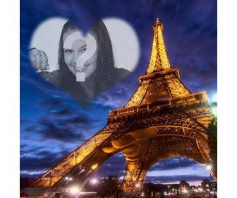 photomontage in paris with the illuminated eiffel tower and semitransparent heart shaped photoframe in the sky to place ur photo