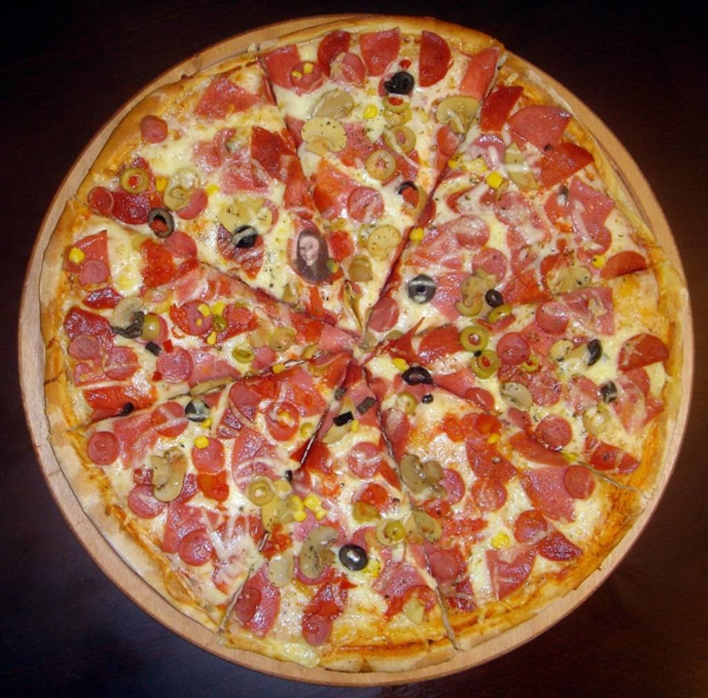 Hide your picture in this delicious pizza to have fun playing with people to find you in..